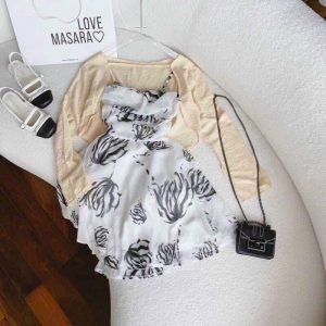 Đầm nữ hai dây họa tiết bông kèm áo khoác croptop màu kem nude